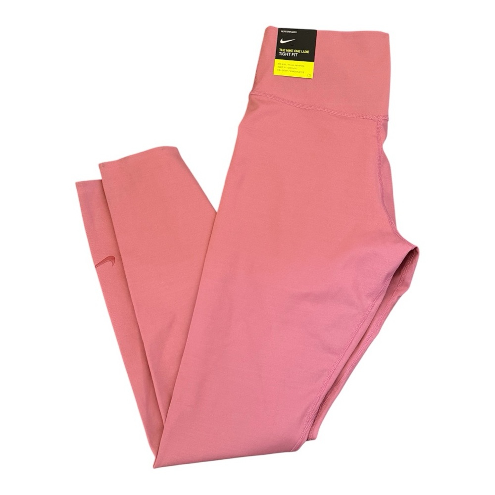 Nike Women’s tight fit mid rise 7/8 length baby pink